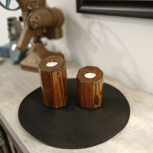 A set of two Wooden, pillar style tealight holders.
wooden tealight holders