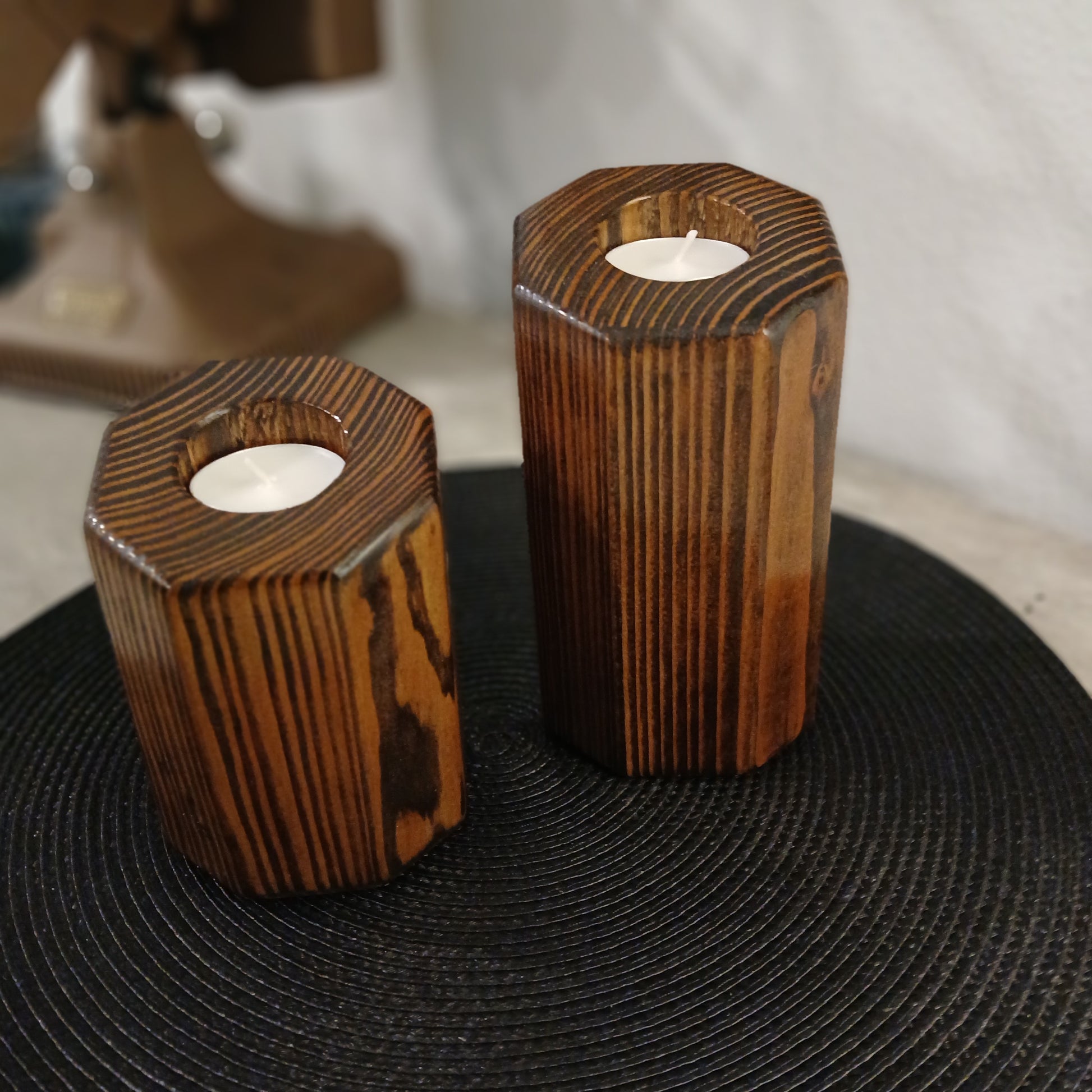 A set of two Wooden, pillar style tealight holders.
wooden tealight holders