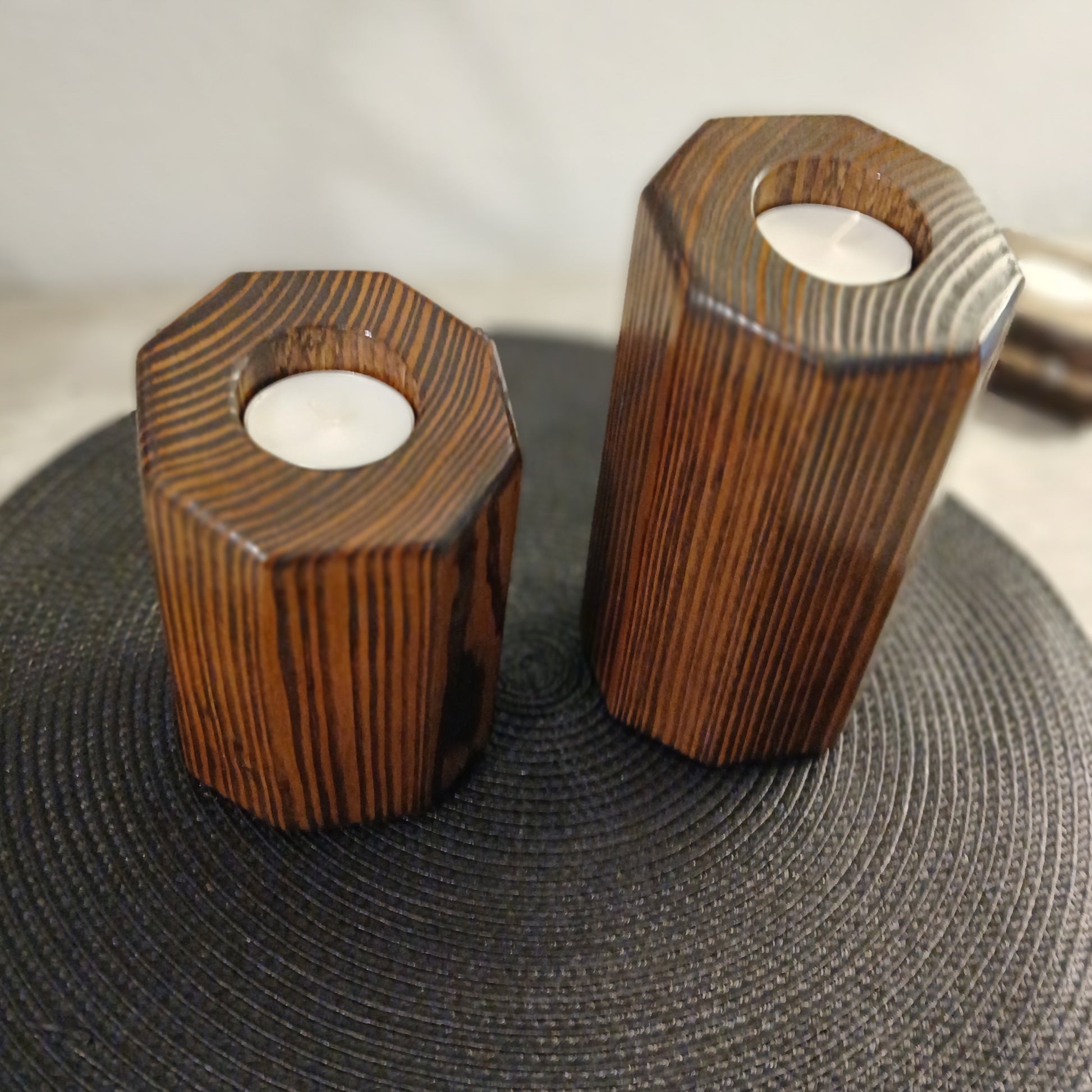 A set of two Wooden, pillar style tealight holders.
wooden tealight holders